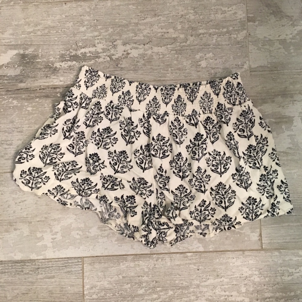 Cream and black flowy shorts